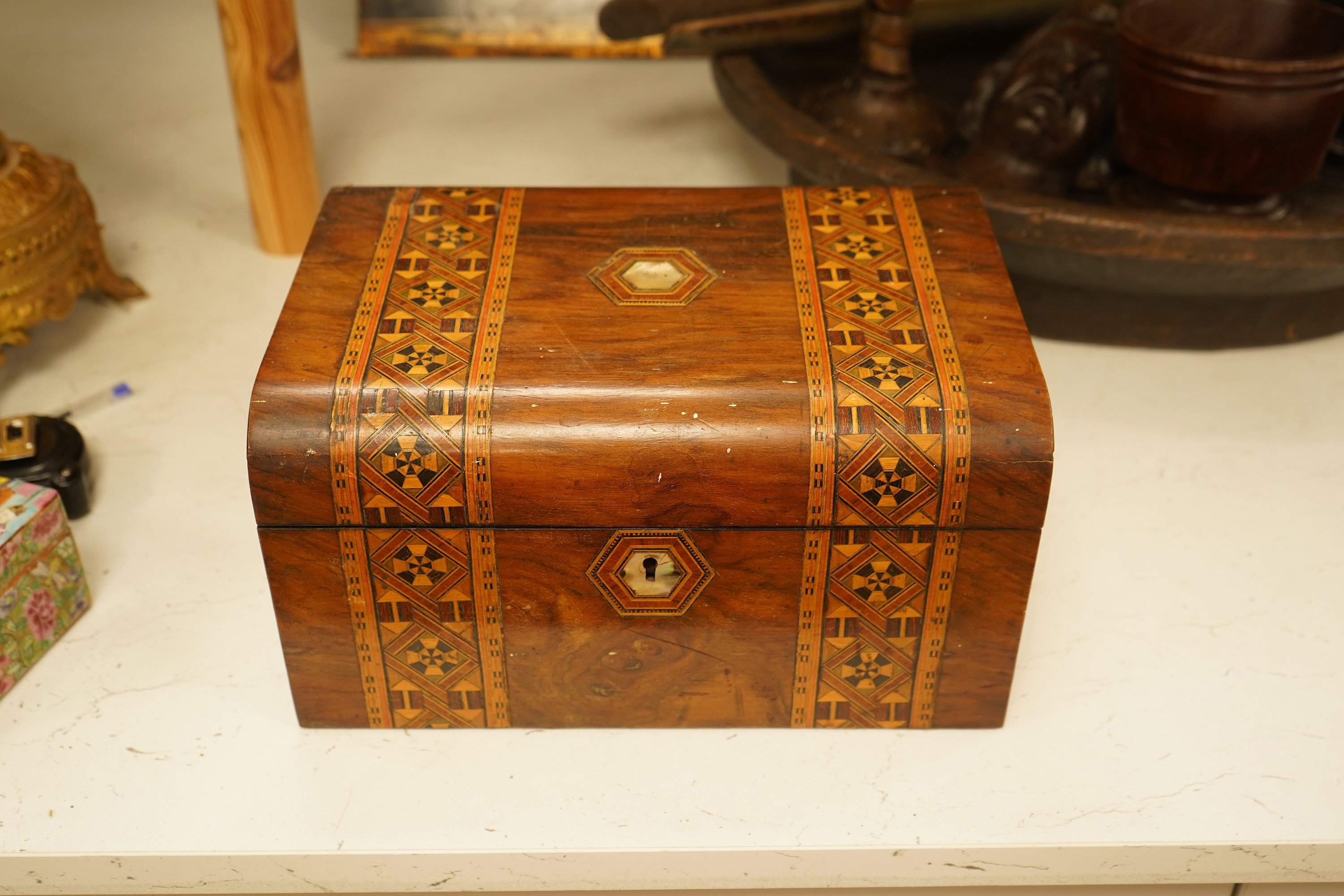 A quantity of mixed treen, including an inlaid box, carved head, large bowl etc and an 18th century French rat de cave wrought iron and treen candlestick. Bowl 49cm